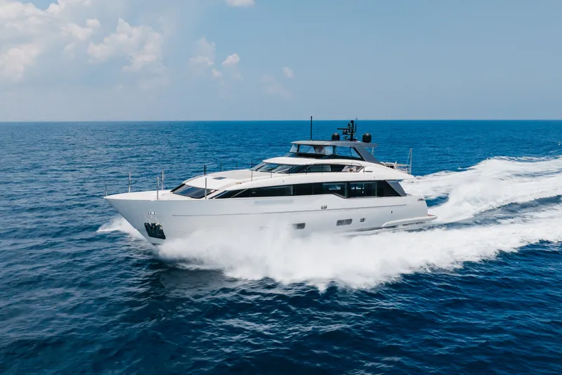 Slide: The Image of 2024 Sanlorenzo SL90A yacht cruising on open sea under clear sky. - 20