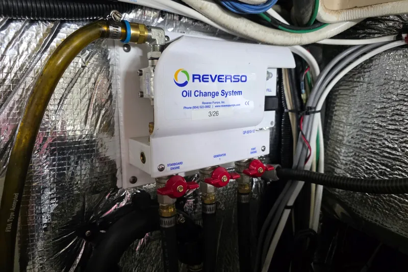 Slide: The Image of Reverso oil change system in 2001 Cruisers Yachts 4450 Express Motoryacht engine room. - 30
