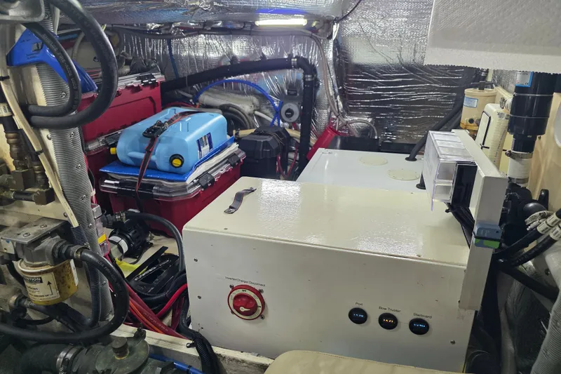 Slide: The Image of Engine room of 2001 Cruisers Yachts 4450 Express Motoryacht with equipment and wiring. - 19