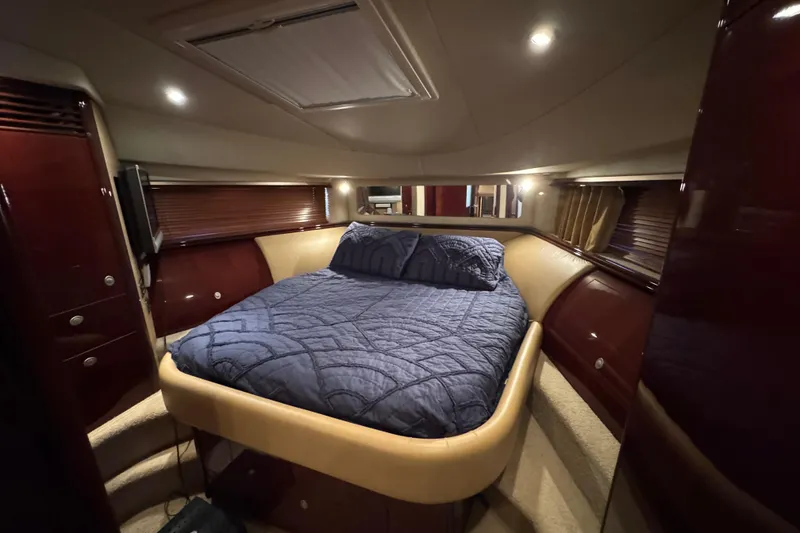 Slide: The Image of Luxurious bedroom interior of 2007 Sea Ray 58 Sedan Bridge yacht. - 33