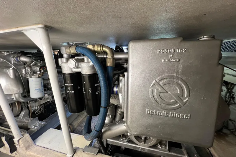 Slide: The Image of Engine compartment of a 1991 Viking Convertible with Detroit Diesel components. - 87
