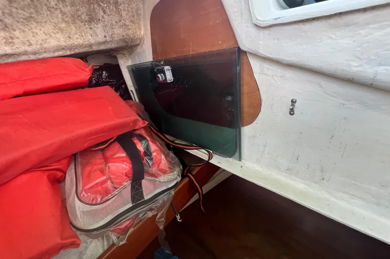 Slide: The Image of Interior of 2001 Beneteau Oceanis 473 with life jackets and storage area. - 37