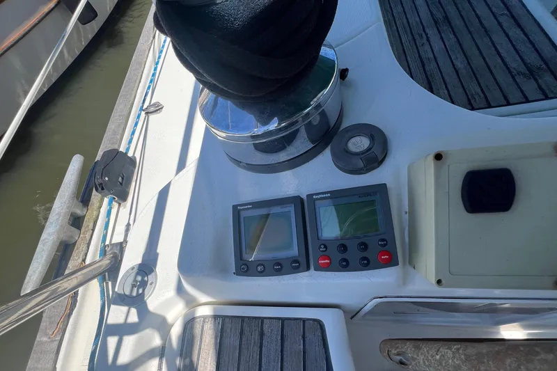 Slide: The Image of Cockpit view of 2001 Beneteau Oceanis 473 sailboat with navigation instruments. - 51