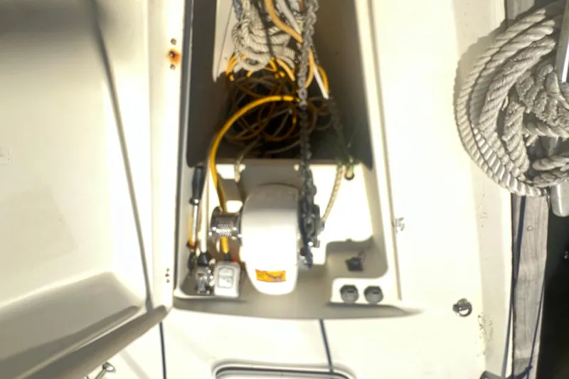 Slide: The Image of Anchor locker of a 2001 Beneteau Oceanis 473 sailboat with ropes and equipment. - 19