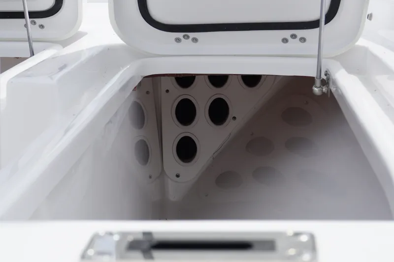 Slide: The Image of Open storage compartment of 2027 Sportsman Masters 247 Bay Boat, showcasing interior design. - 15