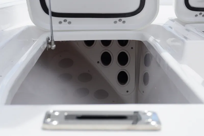 Slide: The Image of Open storage compartment on 2027 Sportsman Masters 247 Bay Boat, showcasing interior design. - 16