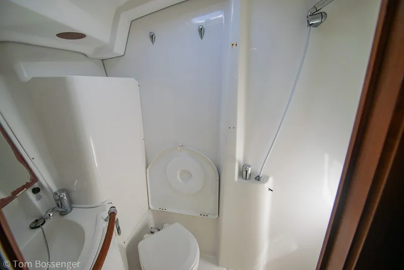 Slide: The Image of Bathroom interior of 2005 Beneteau Oceanis 423 yacht, featuring compact design and fixtures. - 31