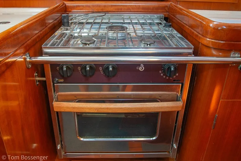 Slide: The Image of Galley stove and oven in 2005 Beneteau Oceanis 423 yacht kitchen. - 17