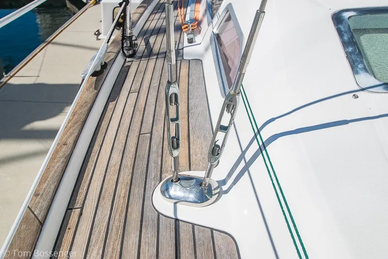 Slide: The Image of Deck of 2005 Beneteau Oceanis 423 sailboat with teak finish and rigging details. - 68