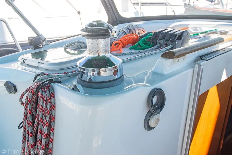 Slide: The Image of Deck of 2005 Beneteau Oceanis 423 sailboat with winch and ropes. - 46