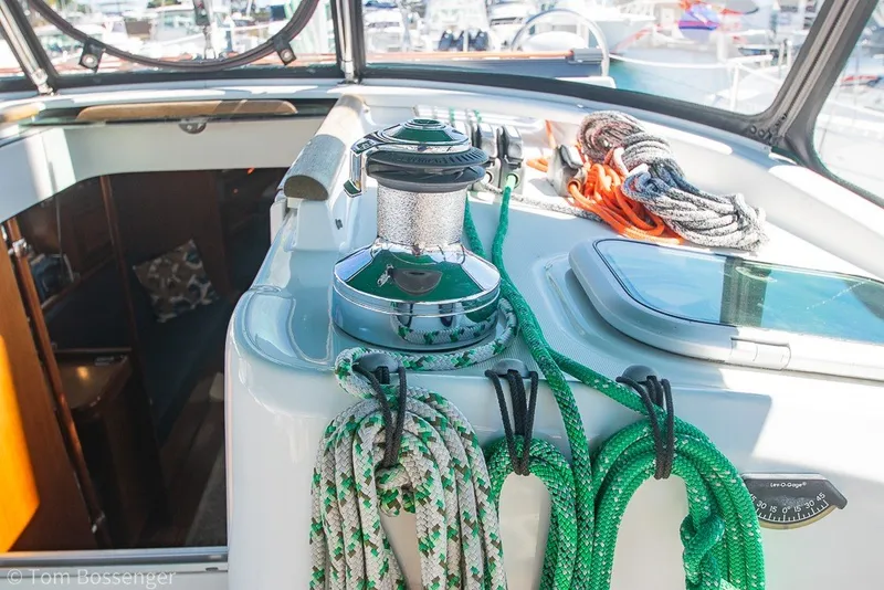 Slide: The Image of Deck of 2005 Beneteau Oceanis 423 sailboat with ropes and winch. - 47