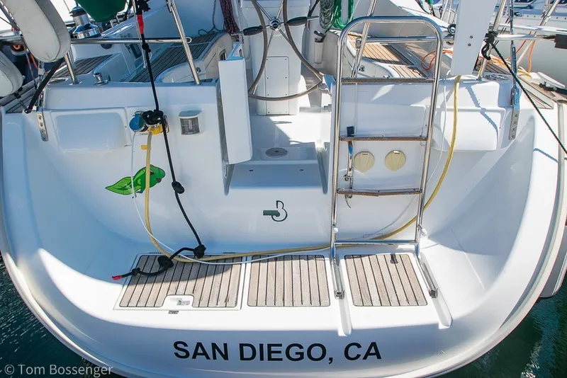 Slide: The Image of Beneteau Oceanis 423 sailboat stern with ladder, docked in San Diego, CA, 2005 model. - 52