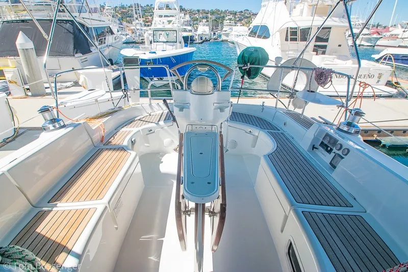 Slide: The Image of Cockpit of 2005 Beneteau Oceanis 423 yacht, featuring sleek design and marina view. - 41