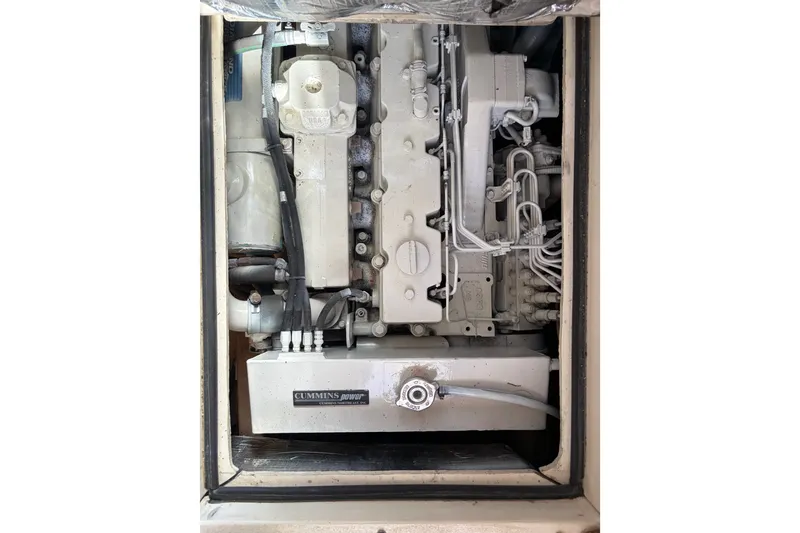 Slide: The Image of Engine compartment of a 2000 Albin 35 Tournament Express with Cummins power unit. - 41