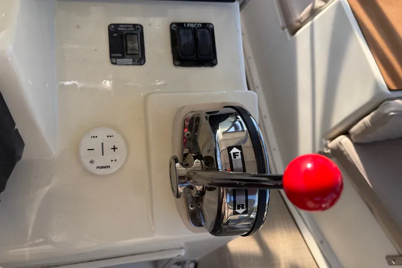 Slide: The Image of Control panel of a 2000 Albin 35 Tournament Express boat with throttle lever. - 57