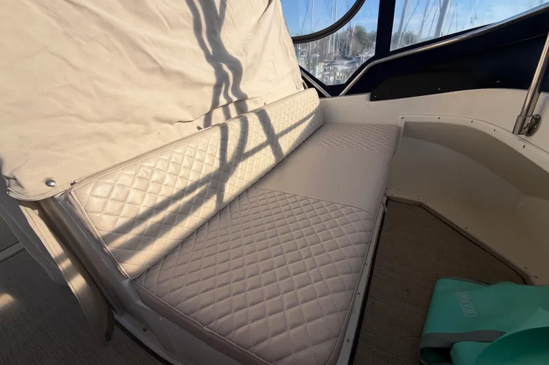 Slide: The Image of Quilted seating on 2000 Albin 35 Tournament Express boat, with sunlight and shadows. - 63