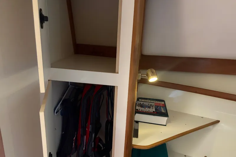 Slide: The Image of Interior of 2000 Albin 35 Tournament Express with closet and reading nook. - 22