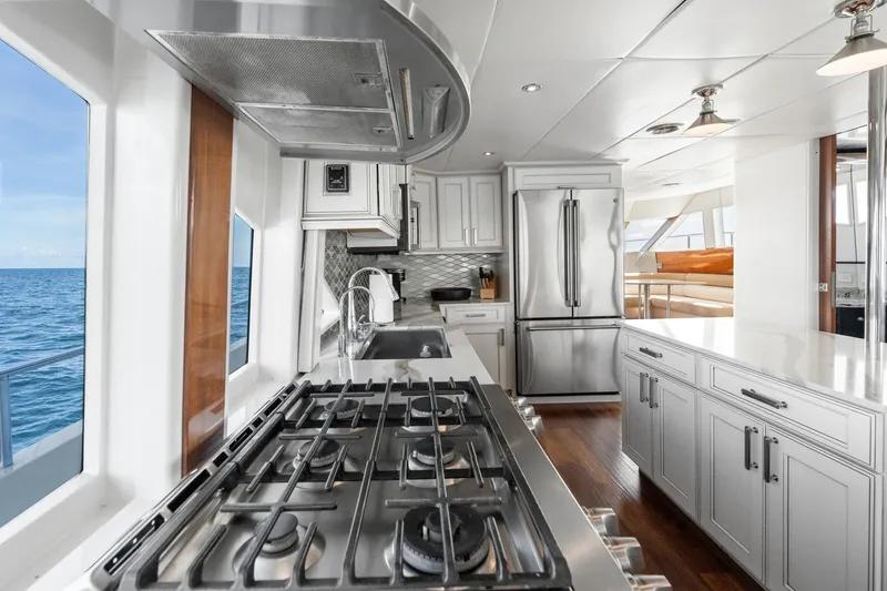 Slide: The Image of Luxurious kitchen interior of 1998 Cheoy Lee Motor Yacht with ocean view. - 21