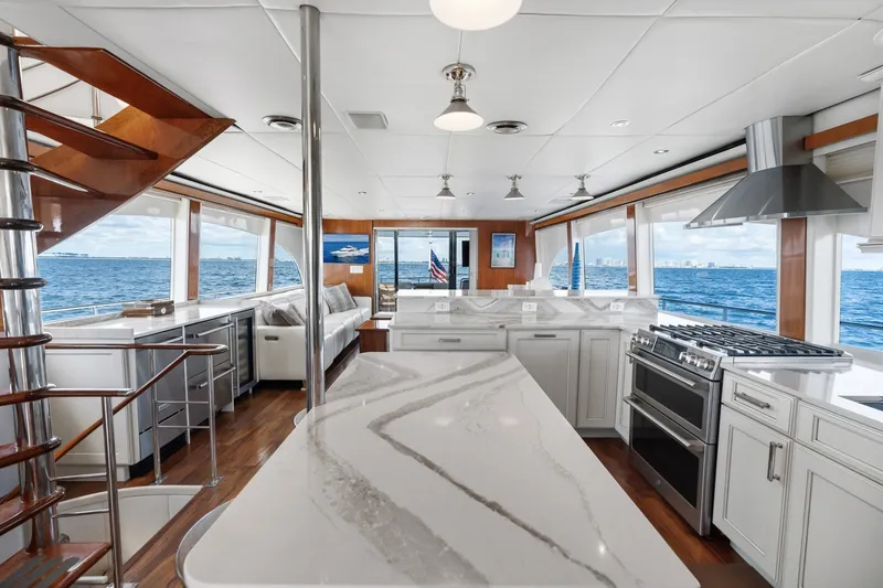 Slide: The Image of Luxurious 1998 Cheoy Lee Motor Yacht interior with modern kitchen and ocean views. - 20