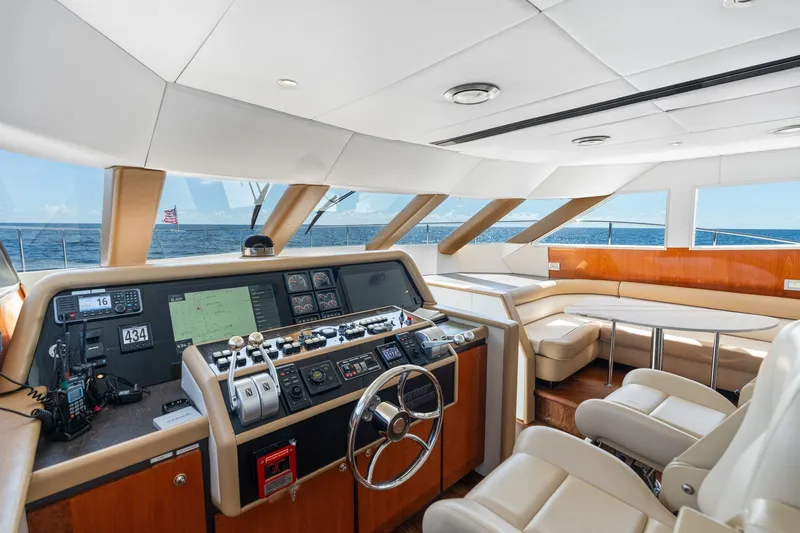 Slide: The Image of Luxurious 1998 Cheoy Lee Motor Yacht helm with panoramic ocean views and modern navigation equipment. - 66