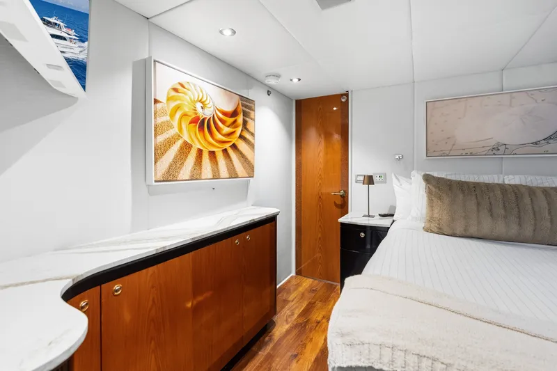 Slide: The Image of Luxurious 1998 Cheoy Lee Motor Yacht cabin with elegant decor and modern furnishings. - 35