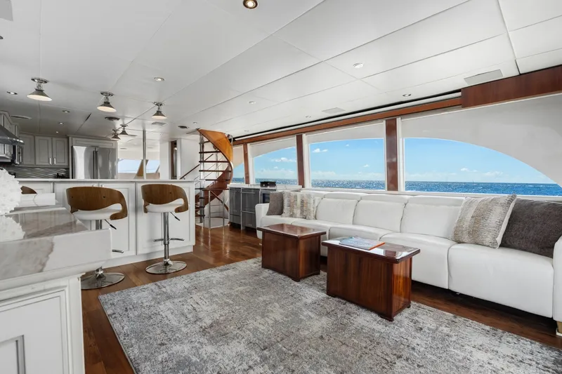 Slide: The Image of Luxurious interior of a 1998 Cheoy Lee Motor Yacht with ocean view and modern furnishings. - 7