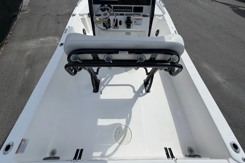 Slide: The Image of 2025 Sea Fox 251 Bay Fox boat interior with steering console and seating. - 15