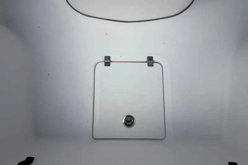 Slide: The Image of 2025 Sea Fox 251 Bay Fox boat hatch with secure latch and hinges. - 54