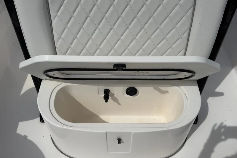Slide: The Image of Livewell compartment on 2025 Sea Fox 251 Bay Fox boat with quilted upholstery. - 59