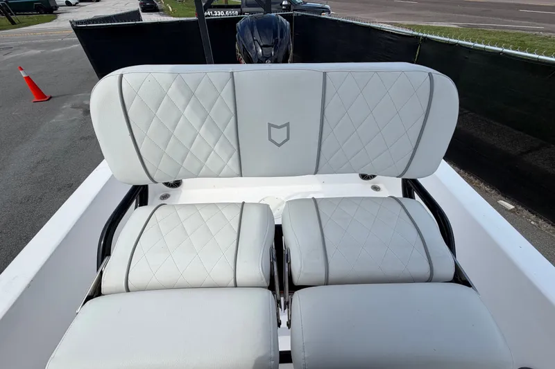 Slide: The Image of 2025 Sea Fox 251 Bay Fox boat seating with diamond-stitched upholstery. - 65