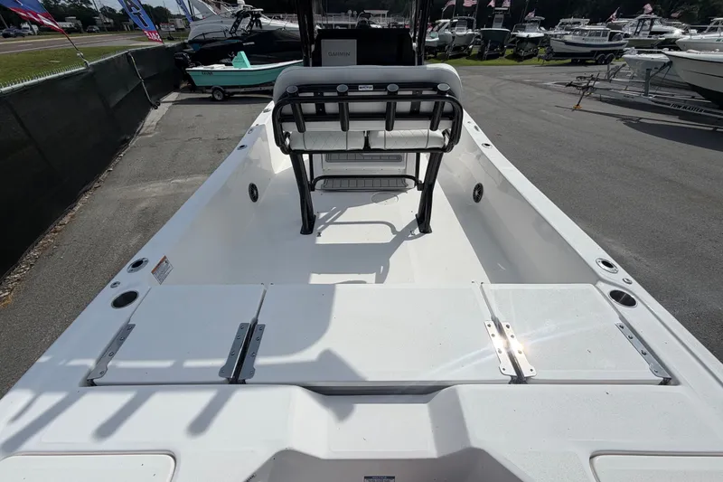 Slide: The Image of 2025 Sea Fox 251 Bay Fox boat interior, showcasing spacious deck and seating area. - 14
