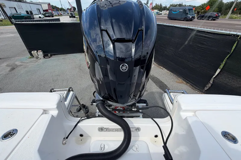 Slide: The Image of 2025 Sea Fox 251 Bay Fox boat with Yamaha outboard motor in a parking area. - 81