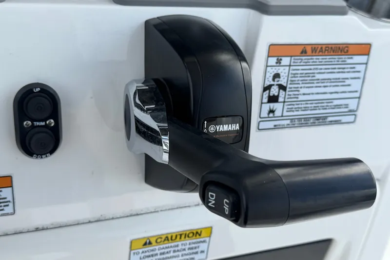Slide: The Image of Close-up of Yamaha throttle control on 2025 Sea Fox 251 Bay Fox boat. - 28