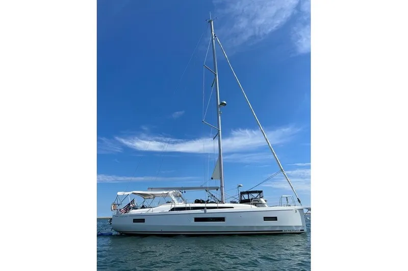 The Image of 2021 Beneteau Oceanis 40.1 sailboat on calm water under blue sky. - 0