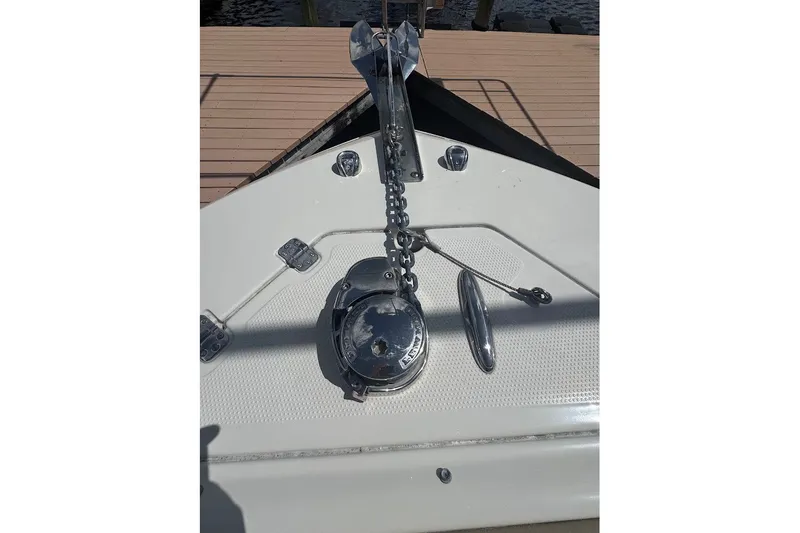 Slide: The Image of Bow of 2020 Sailfish 245 DC boat with anchor and chain mechanism. - 15
