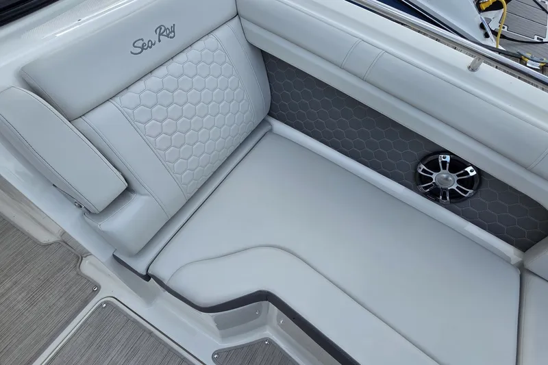 Slide: The Image of Luxurious seating on 2020 Sea Ray SDX 290 boat with hexagonal pattern and speaker. - 12