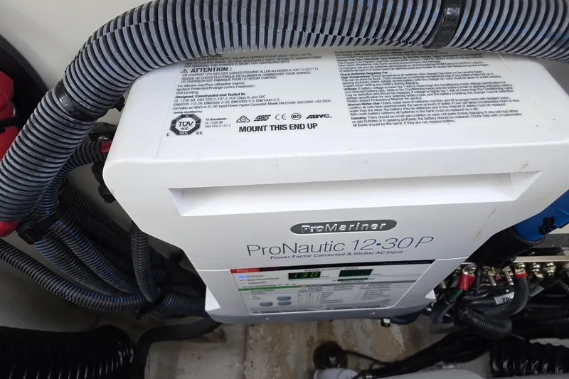 Slide: The Image of ProNautic 12-30P charger in 2020 Sea Ray SDX 290 boat engine compartment. - 26