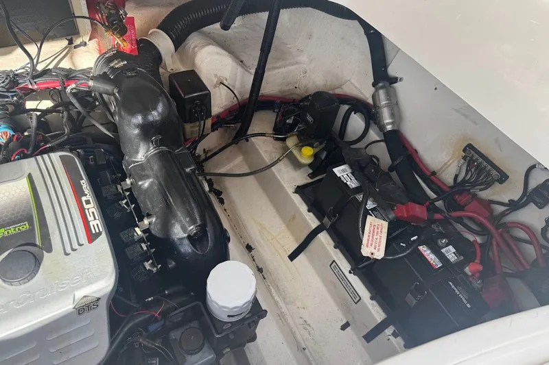 Slide: The Image of Engine compartment of a 2014 Sea Ray SLX 250 boat, featuring a MerCruiser 350 MAG engine. - 17