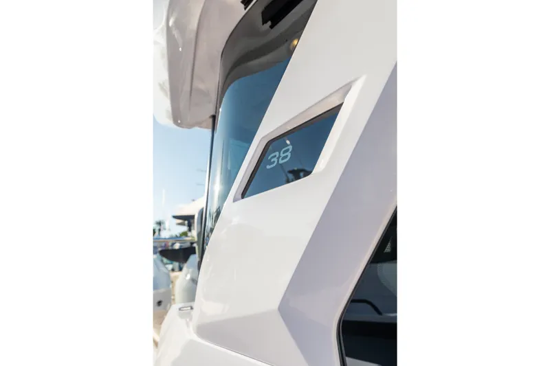 Slide: The Image of Close-up of 2027 Axopar 38 XC Cross Cabin window detail. - 12