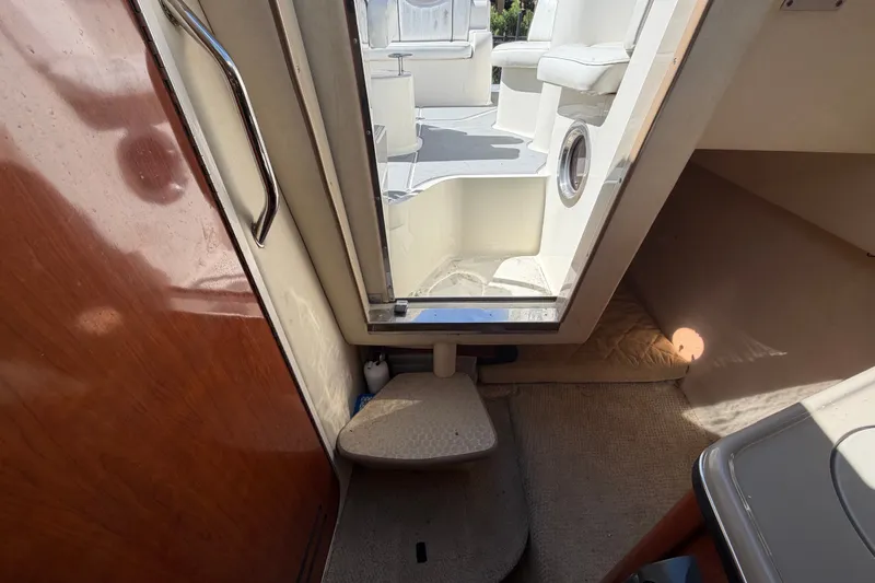 Slide: The Image of Interior view of 2007 Sea Ray 240 Sundancer cabin entrance with seating area. - 74