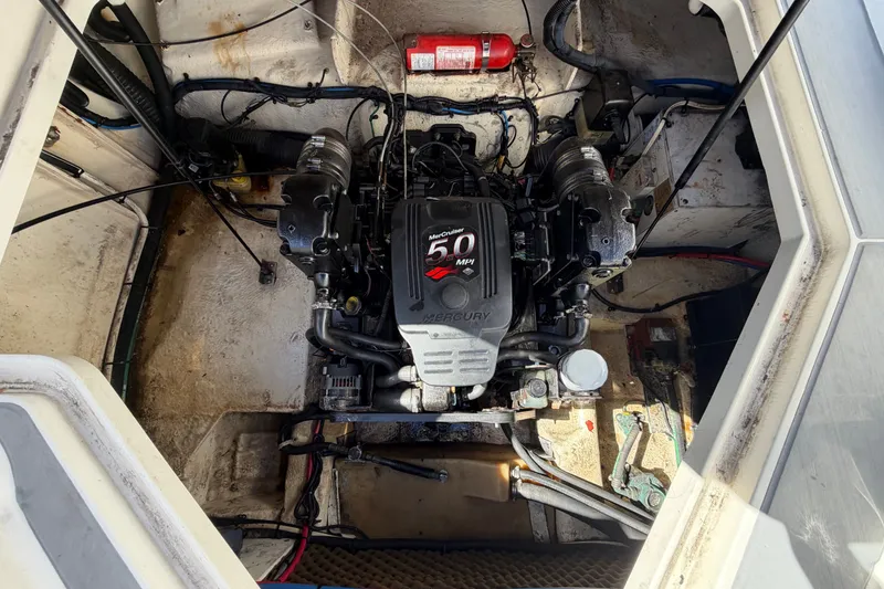 Slide: The Image of Engine compartment of a 2007 Sea Ray 240 Sundancer with MerCruiser 5.0 MPI engine. - 82