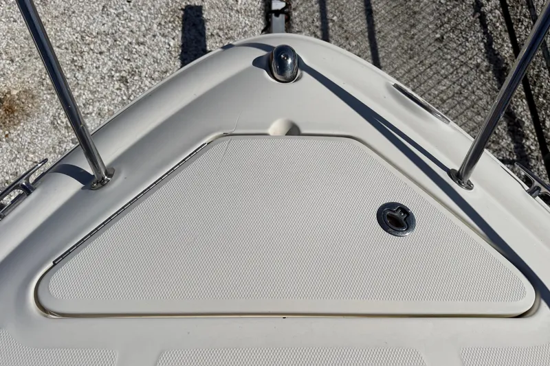 Slide: The Image of Bow of a 2007 Sea Ray 240 Sundancer boat with stainless steel railings. - 39