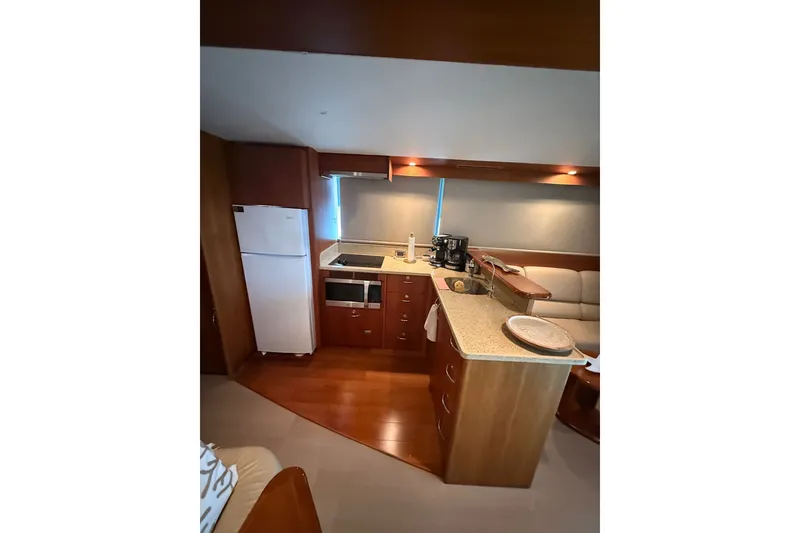 Slide: The Image of Interior of 2010 Maritimo 500 Offshore Convertible yacht kitchen area. - 23