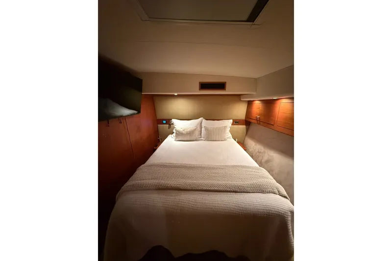 Slide: The Image of Luxurious bedroom interior of 2010 Maritimo 500 Offshore Convertible yacht. - 25