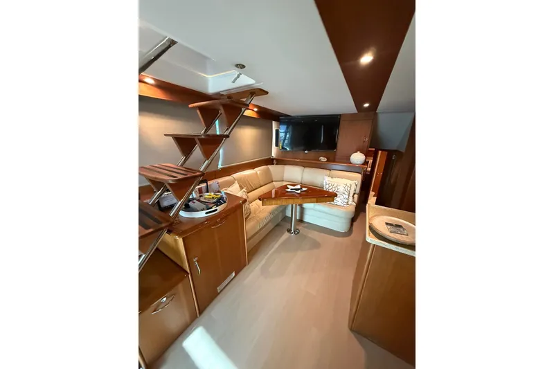 Slide: The Image of Luxurious interior of 2010 Maritimo 500 Offshore Convertible yacht with elegant seating and modern decor. - 22