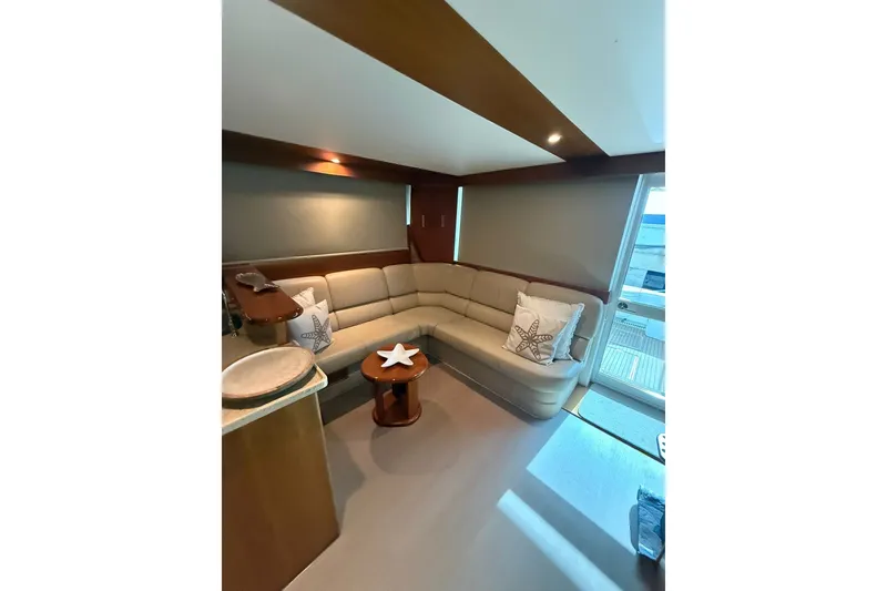 Slide: The Image of Luxurious interior of 2010 Maritimo 500 Offshore Convertible yacht with plush seating and elegant decor. - 24