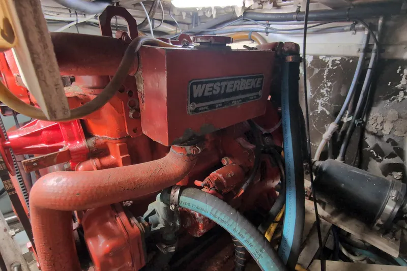 Slide: The Image of Engine room of a 1990 Grand Banks 36 Classic with Westerbeke engine. - 64