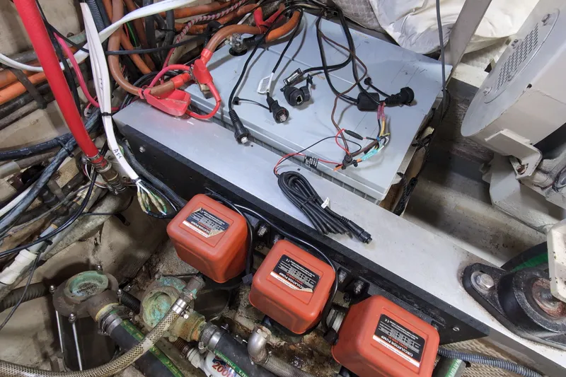 Slide: The Image of Engine room wiring and components of a 1990 Grand Banks 36 Classic boat. - 60
