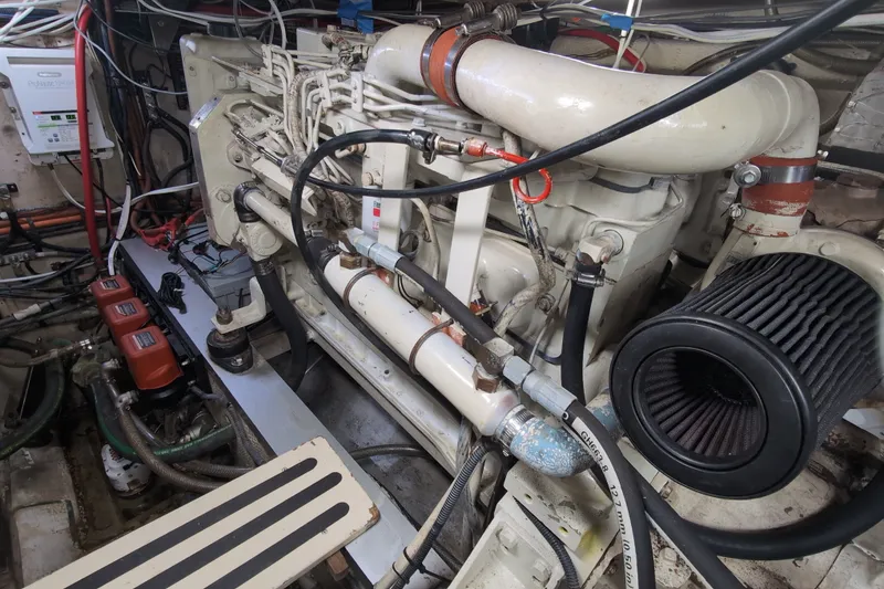 Slide: The Image of Engine room of a 1990 Grand Banks 36 Classic boat, showcasing mechanical components. - 55