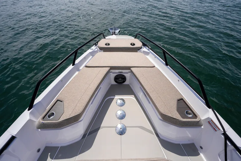 Slide: The Image of Bow seating area of 2027 Axopar 38 Cross Cabin on water. - 15